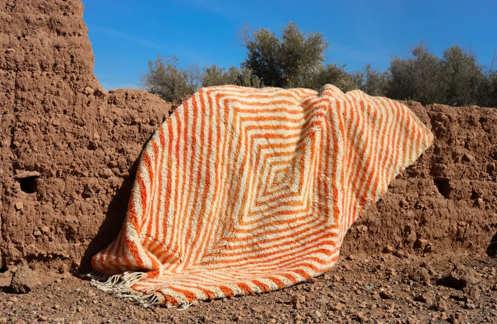Moroccan rug laid over a wall